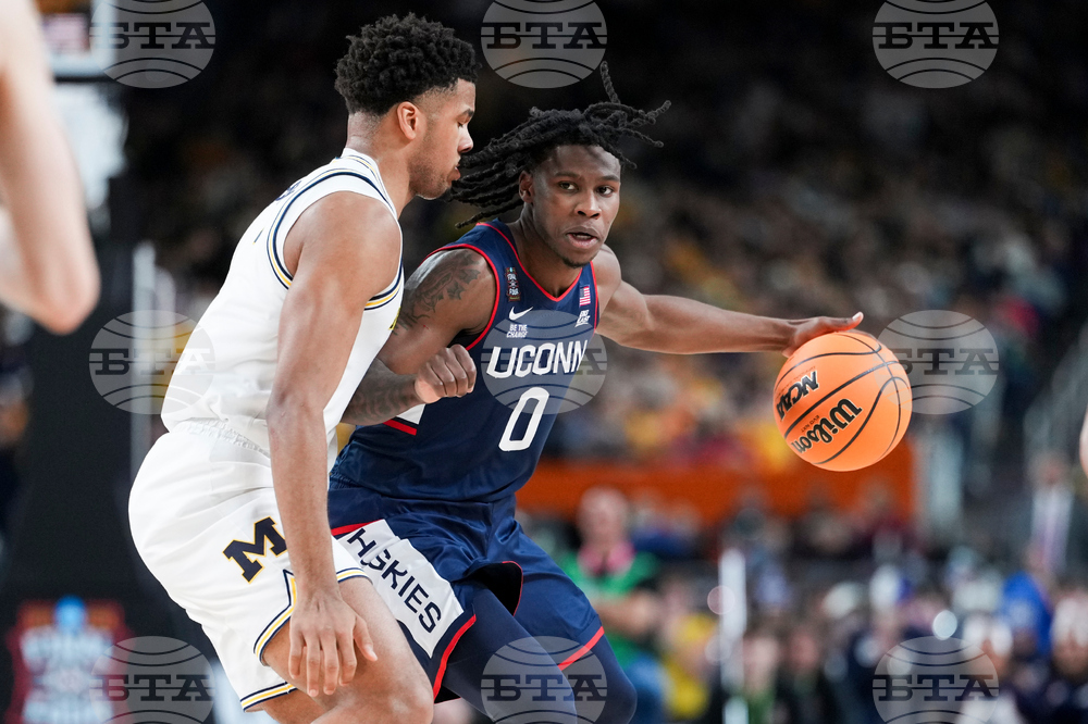 NCAA UConn Michigan Basketball