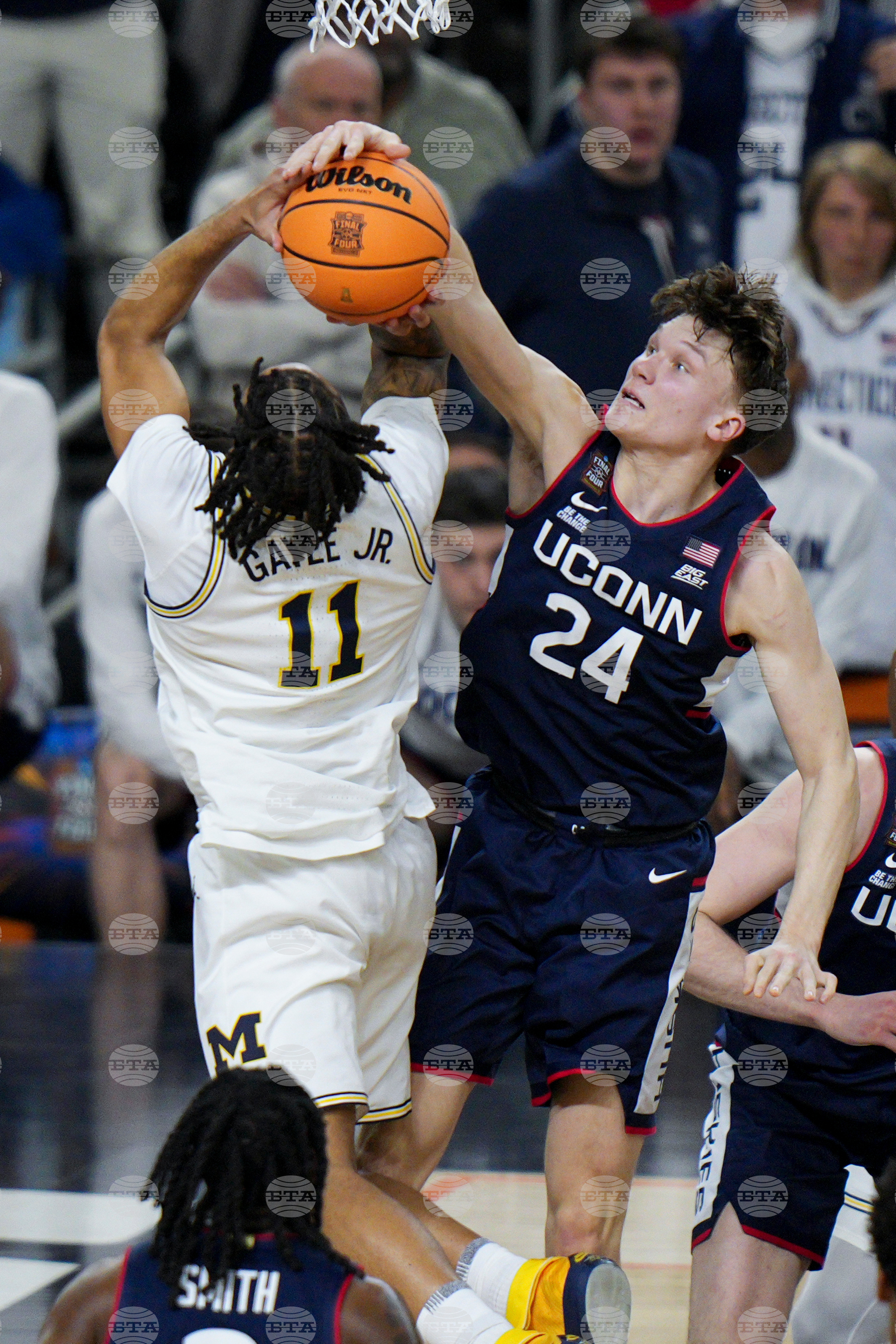 NCAA UConn Michigan Basketball