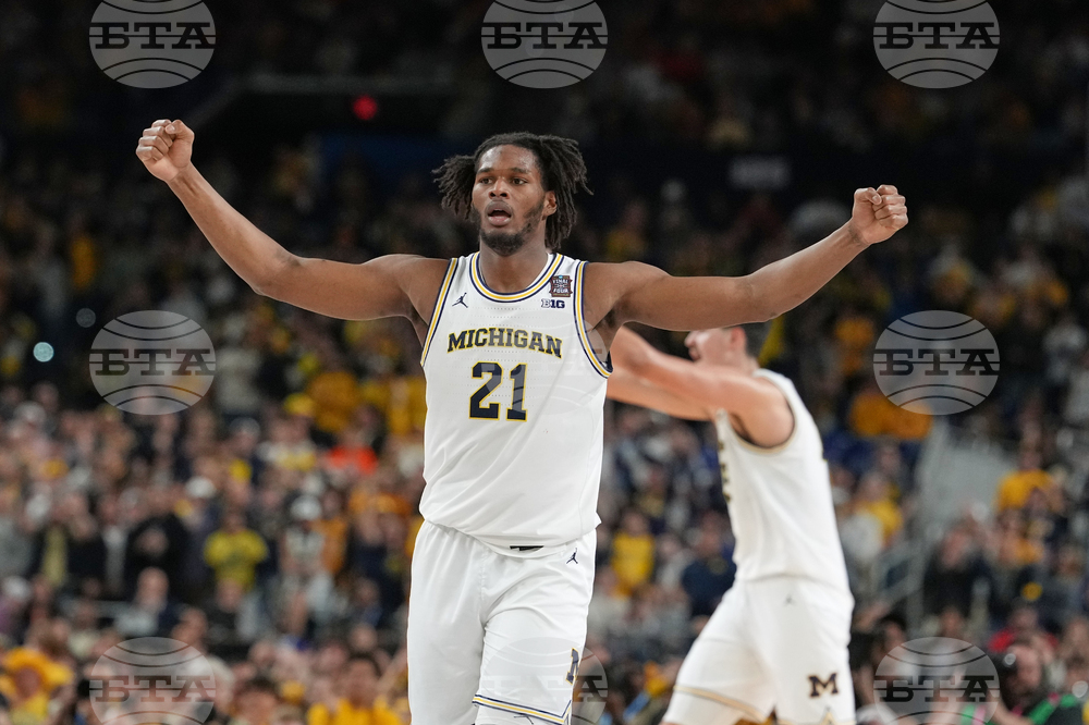 NCAA UConn Michigan Basketball