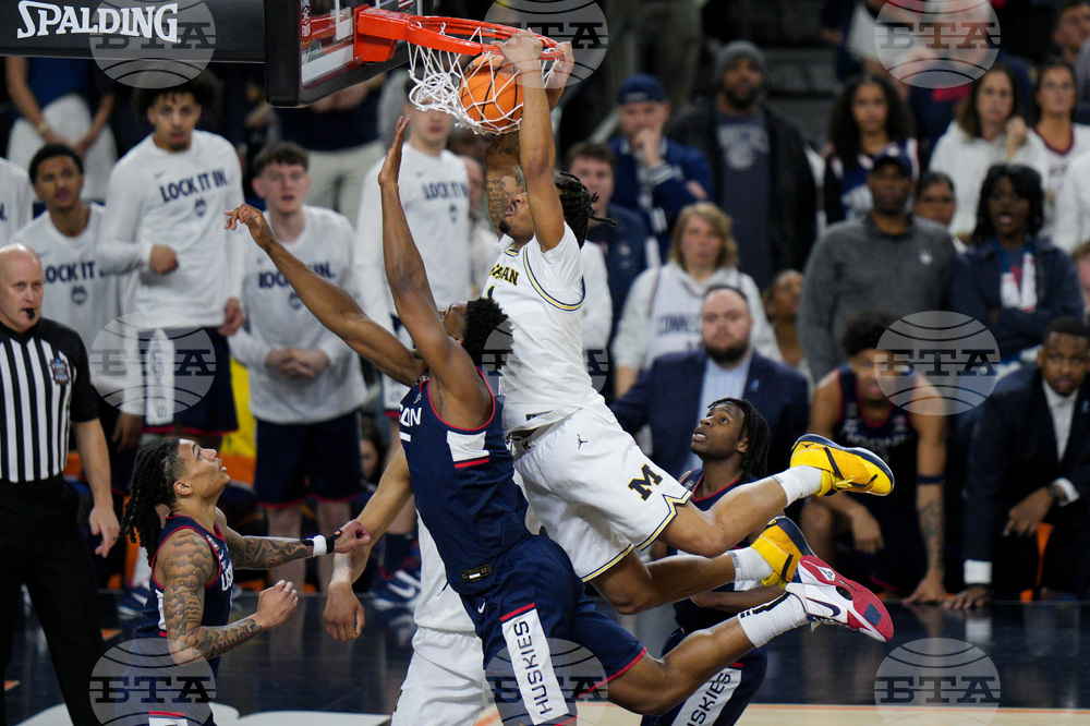 NCAA UConn Michigan Basketball