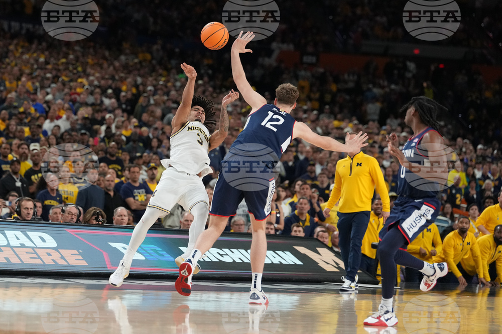 NCAA UConn Michigan Basketball