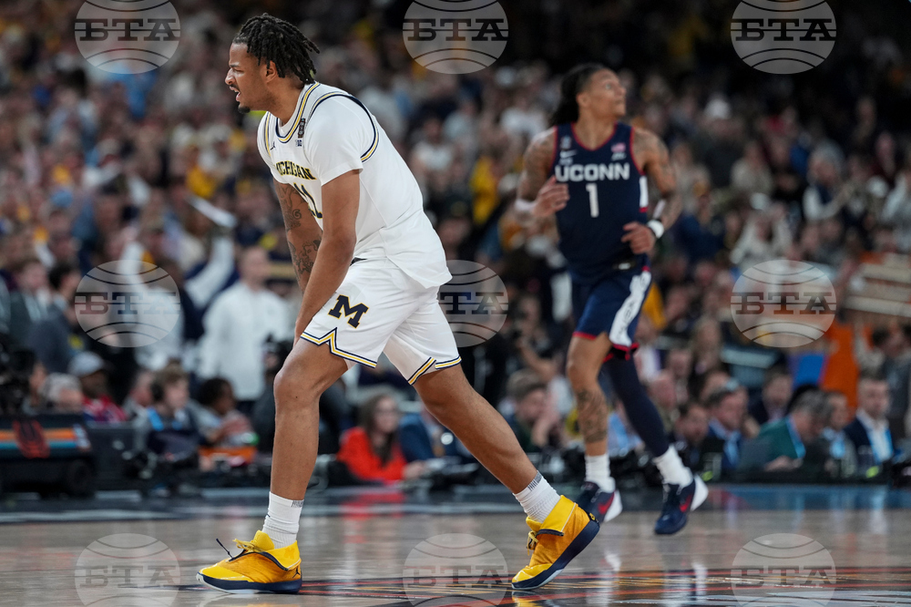 NCAA UConn Michigan Basketball