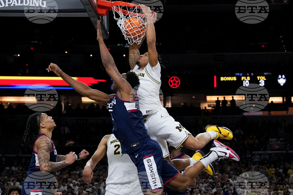 NCAA UConn Michigan Basketball