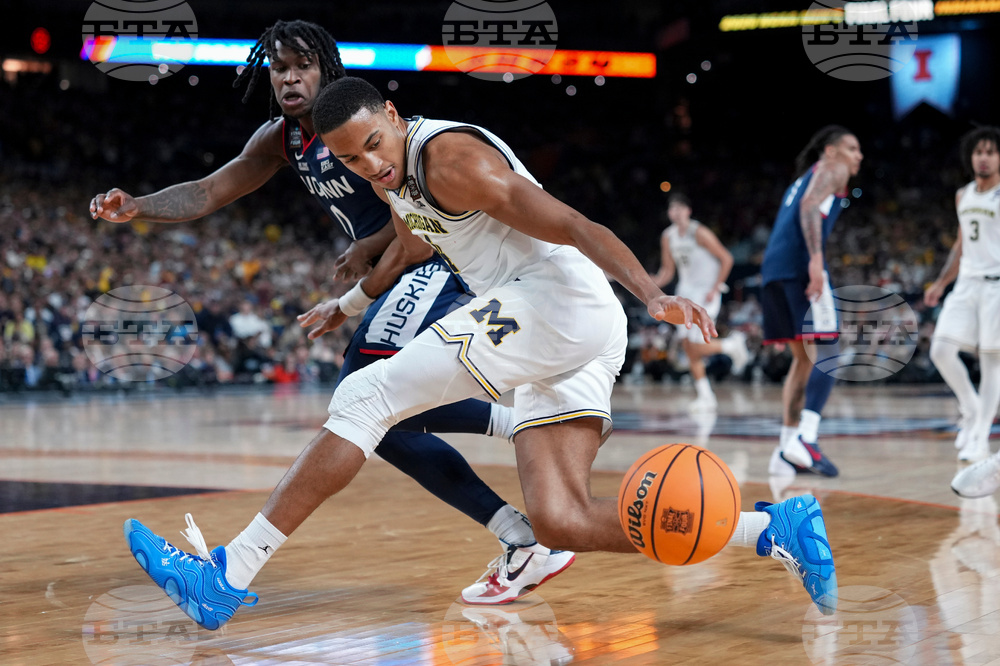 NCAA UConn Michigan Basketball