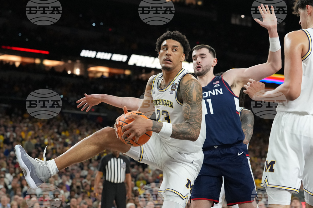 NCAA UConn Michigan Basketball