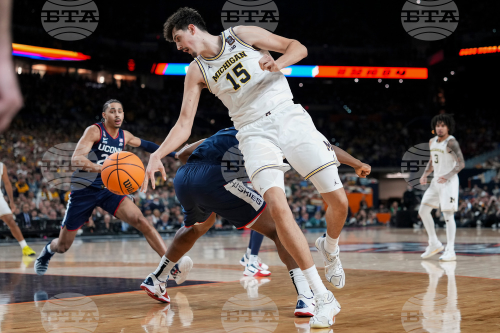 NCAA UConn Michigan Basketball