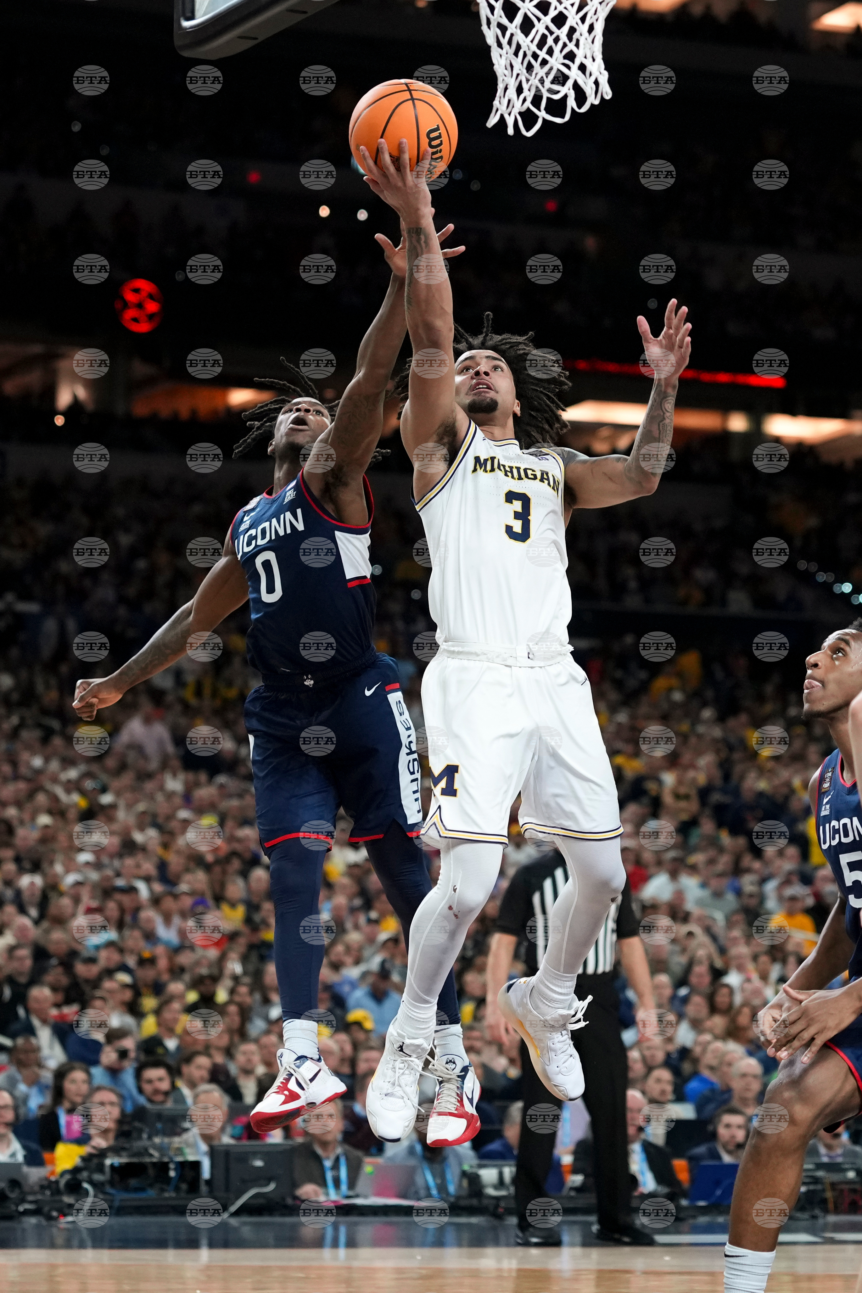 NCAA UConn Michigan Basketball