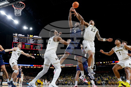NCAA UConn Michigan Basketball