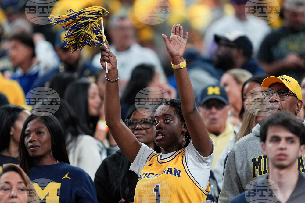 NCAA UConn Michigan Basketball