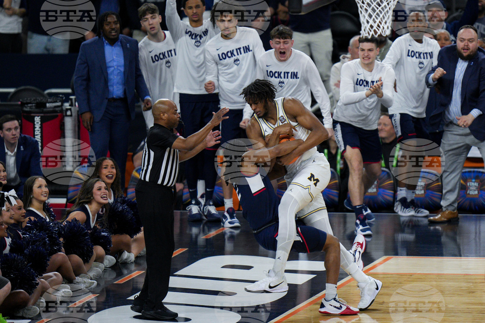 NCAA UConn Michigan Basketball