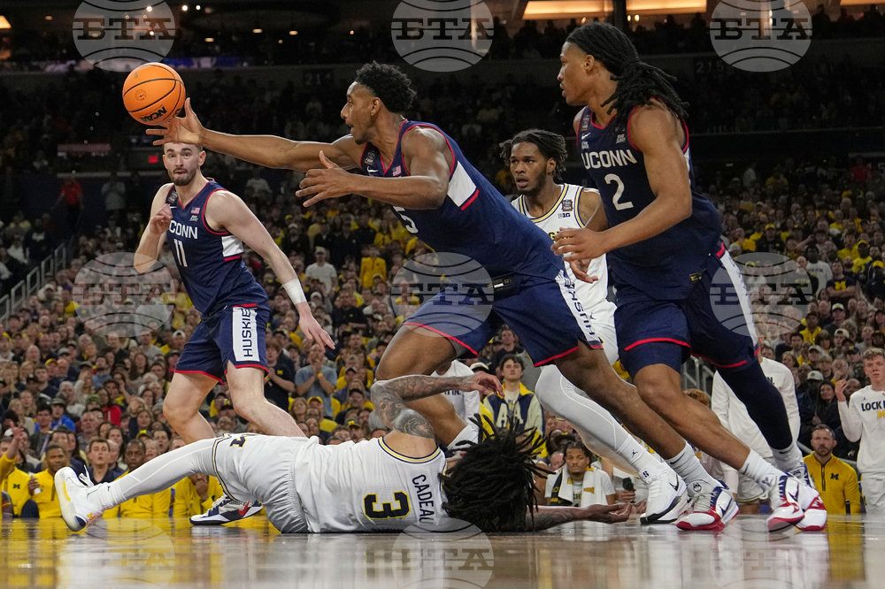 NCAA UConn Michigan Basketball