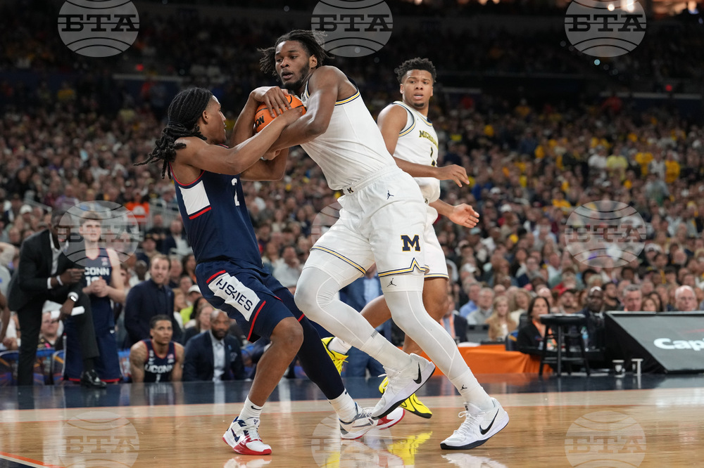 NCAA UConn Michigan Basketball