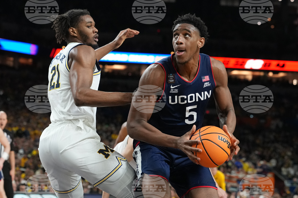 NCAA UConn Michigan Basketball