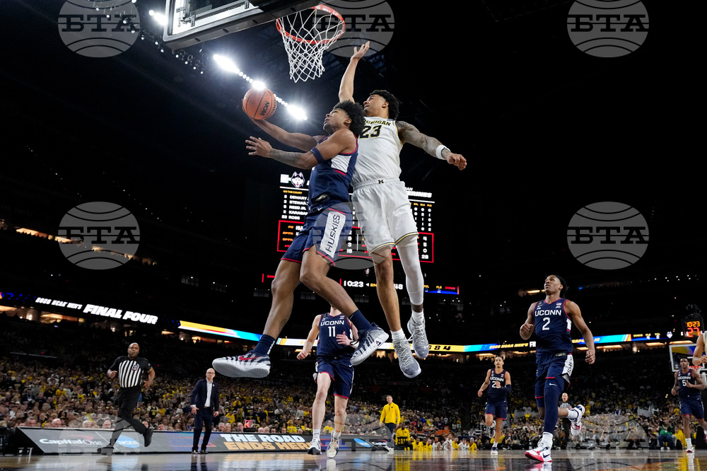 NCAA UConn Michigan Basketball