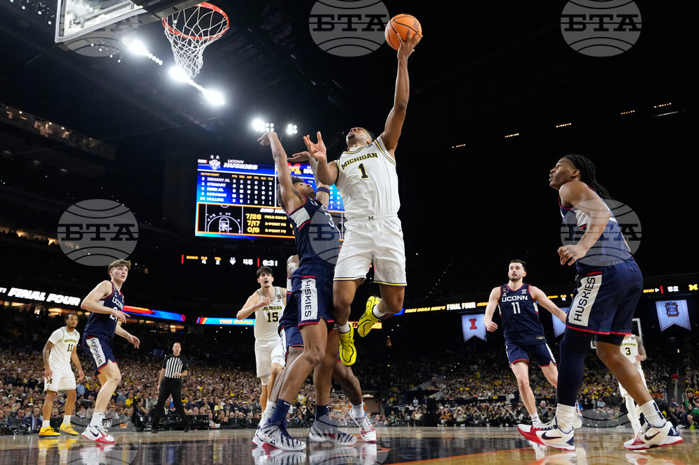 NCAA UConn Michigan Basketball
