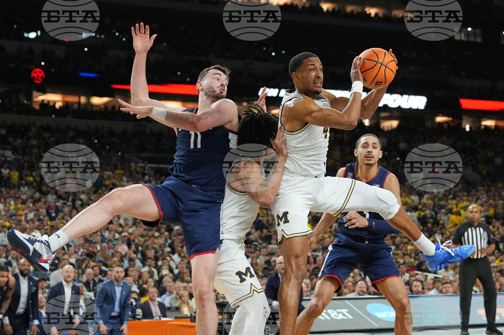 NCAA UConn Michigan Basketball