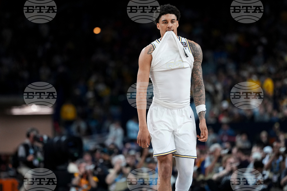 NCAA UConn Michigan Basketball