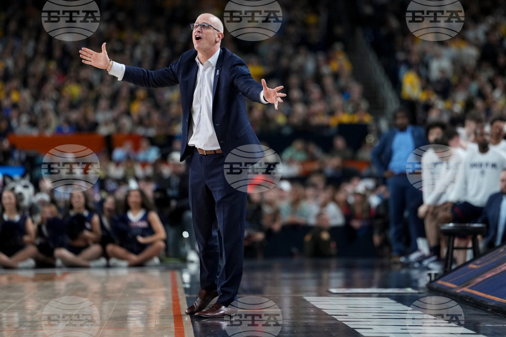 NCAA UConn Michigan Basketball