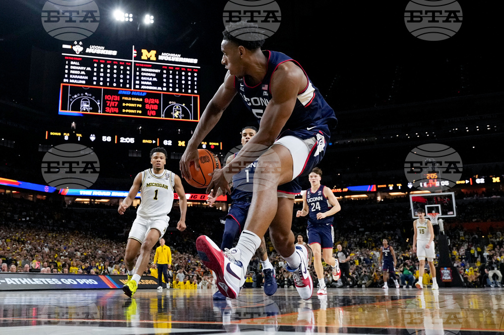NCAA UConn Michigan Basketball