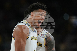 NCAA UConn Michigan Basketball