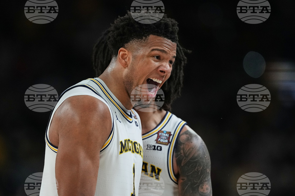 NCAA UConn Michigan Basketball