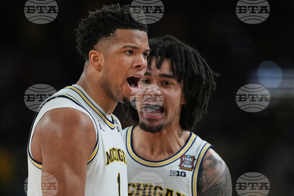 NCAA UConn Michigan Basketball