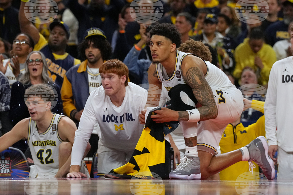 NCAA UConn Michigan Basketball