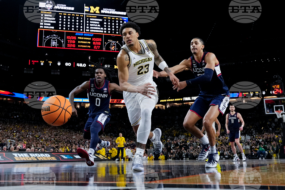 NCAA UConn Michigan Basketball