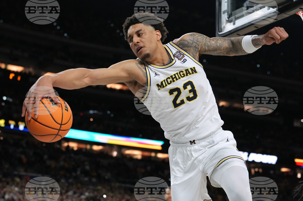 NCAA UConn Michigan Basketball