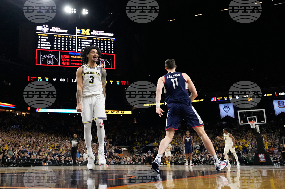 NCAA UConn Michigan Basketball