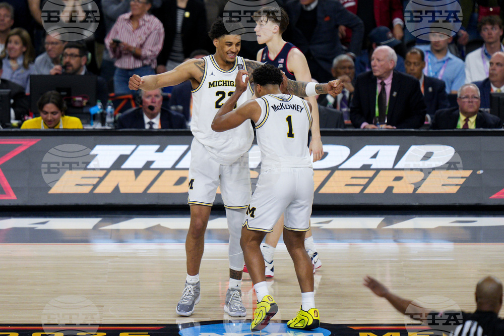 NCAA UConn Michigan Basketball