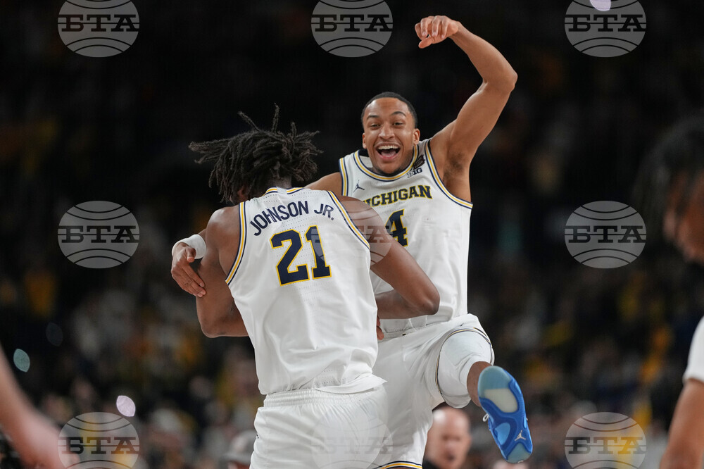 NCAA UConn Michigan Basketball