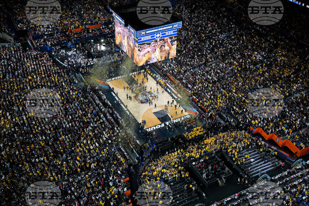 NCAA UConn Michigan Basketball