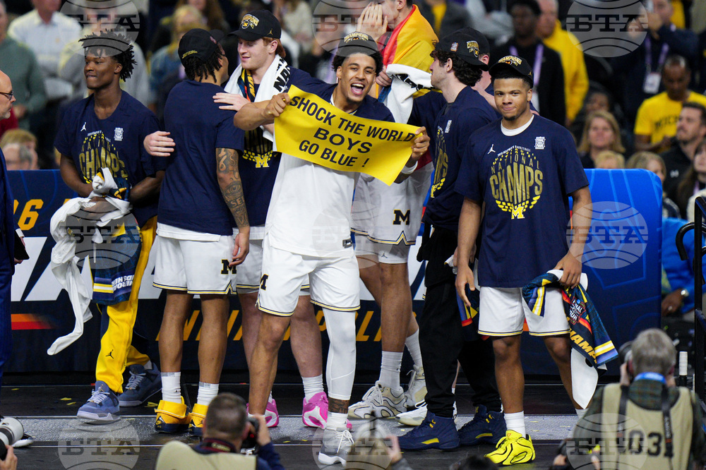 NCAA UConn Michigan Basketball