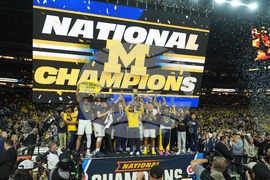 APTOPIX NCAA UConn Michigan Basketball