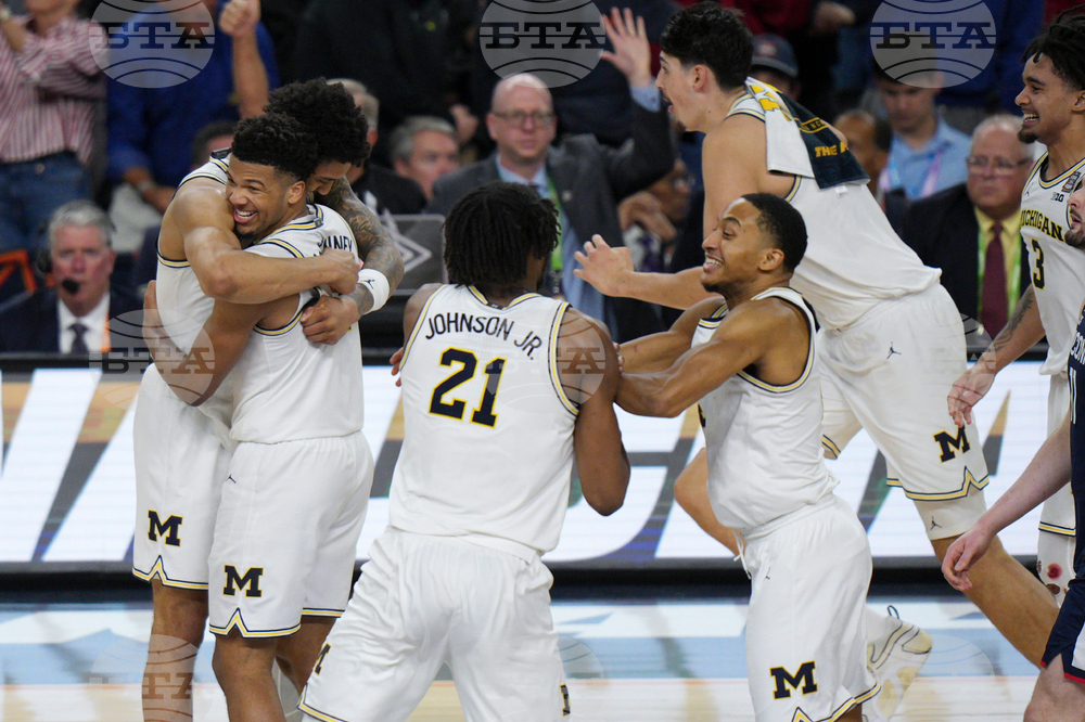 NCAA UConn Michigan Basketball