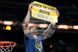 APTOPIX NCAA UConn Michigan Basketball