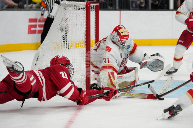 APTOPIX NCAA Denver Wisconsin Hockey