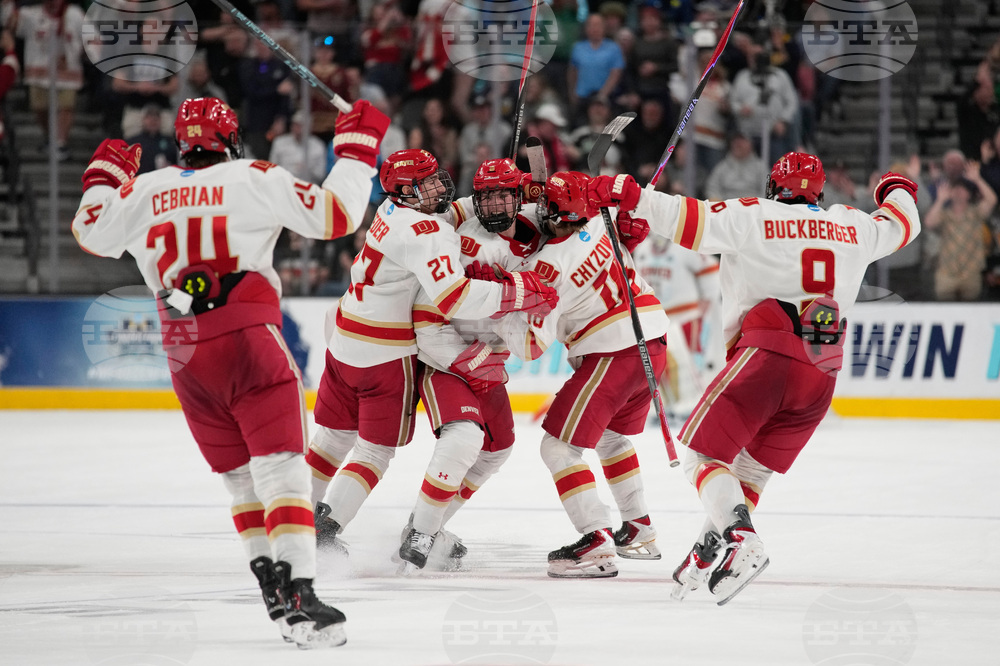 APTOPIX NCAA Denver Wisconsin Hockey