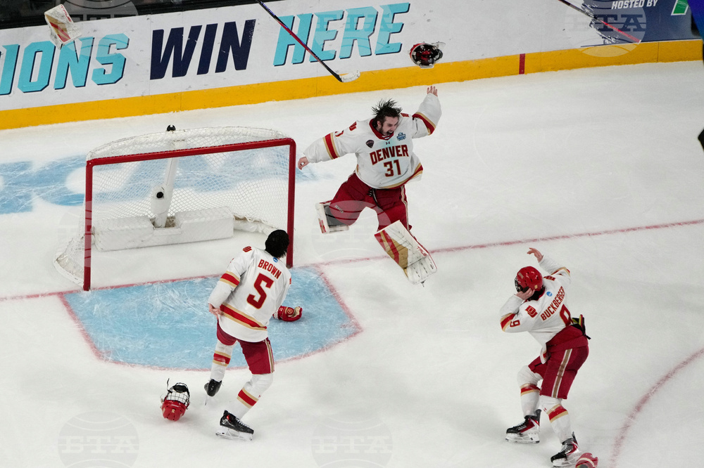 APTOPIX NCAA Denver Wisconsin Hockey