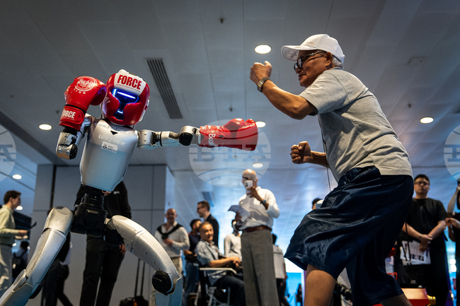 APTOPIX Hong Kong Robots