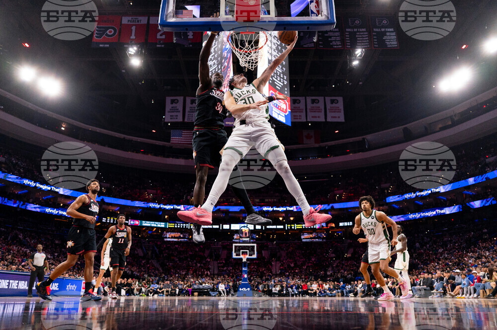 APTOPIX Bucks 76ers Basketball