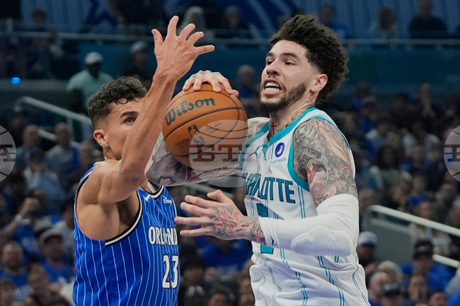 APTOPIX Hornets Magic Basketball