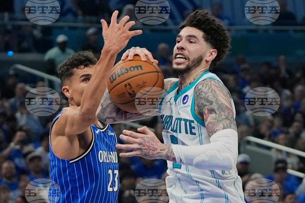 APTOPIX Hornets Magic Basketball