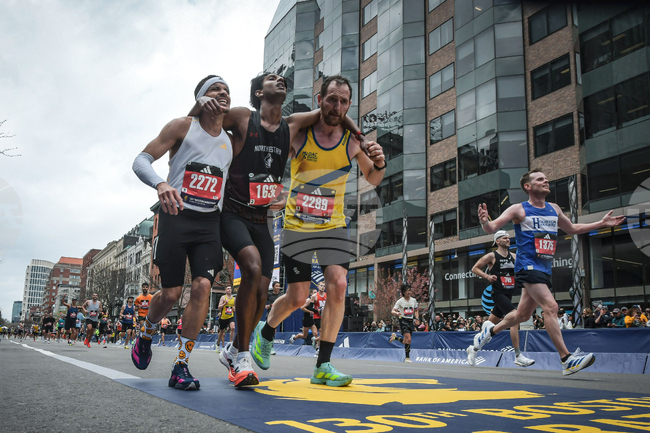 Boston Marathon Helping Runners