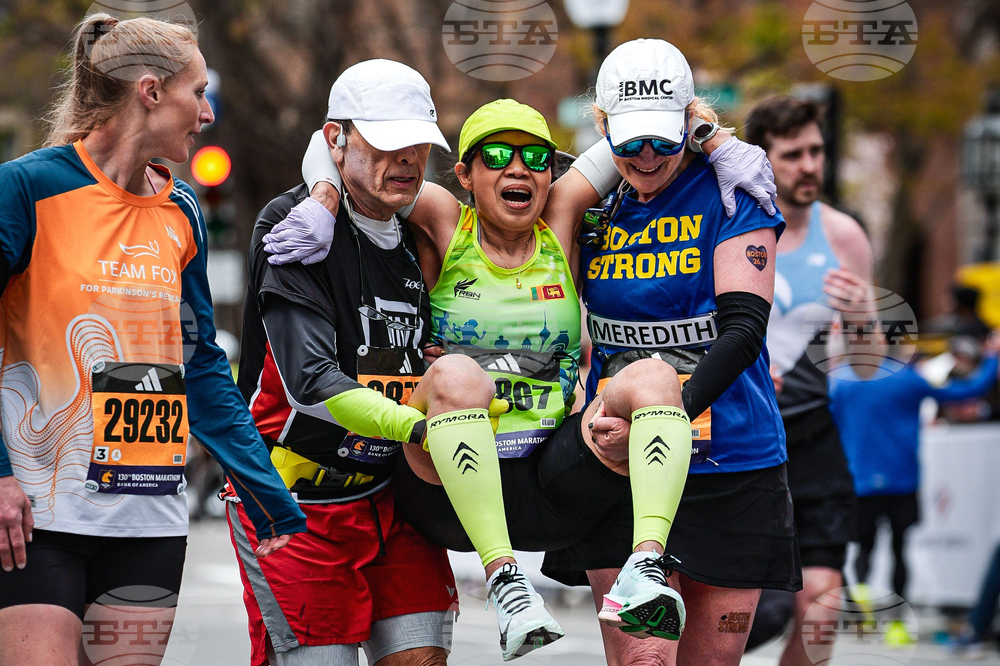 Boston Marathon Helping Runners