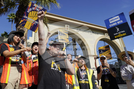 Striking Workers Rise