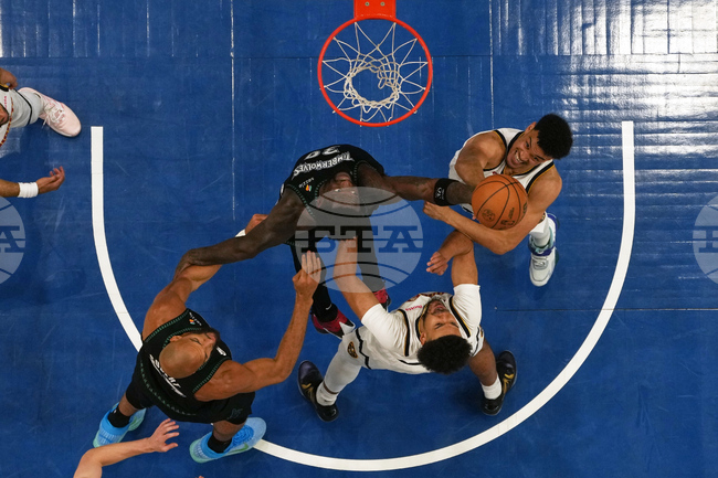 APTOPIX Nuggets Timberwolves Basketball