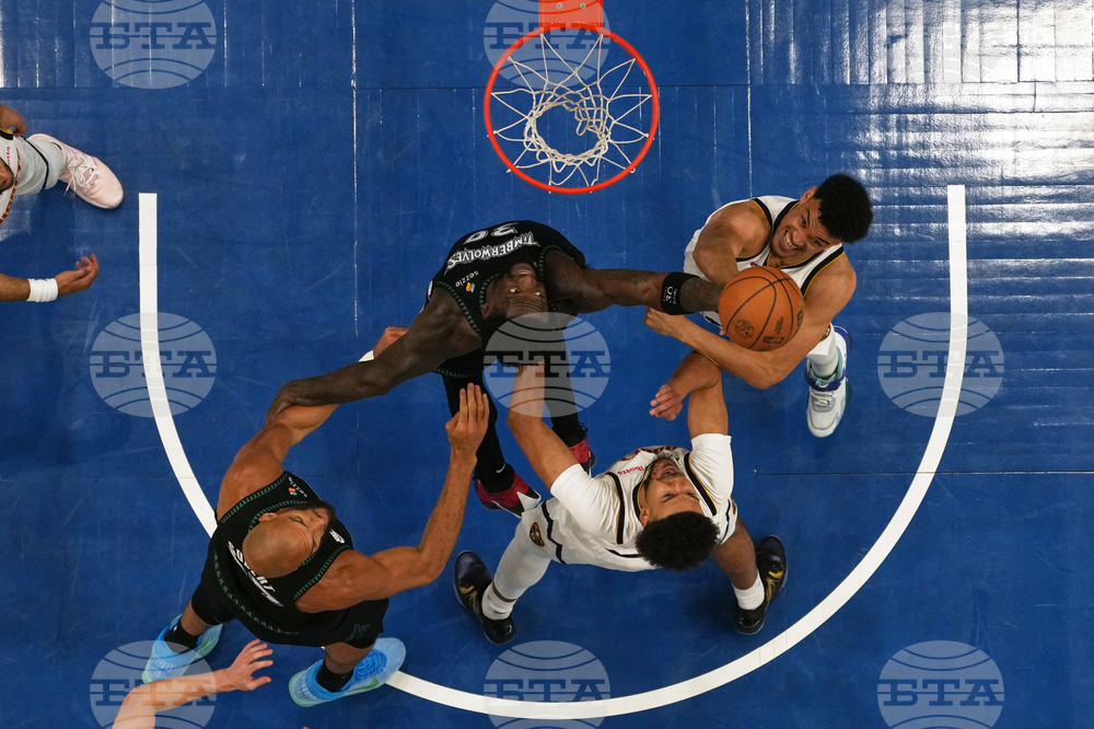 APTOPIX Nuggets Timberwolves Basketball