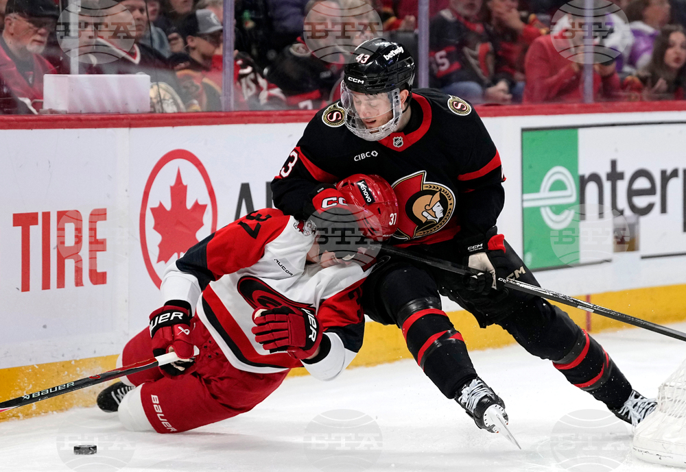 APTOPIX Hurricanes Senators Hockey
